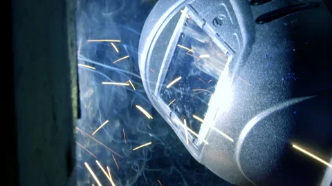Welder welding metal. Stock Footage 210478323