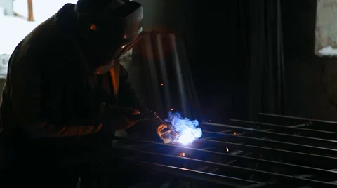 A welder is welding in winter Stock Footage 61257259
