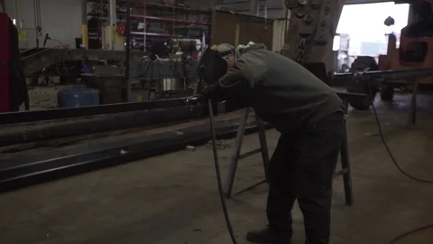 Welder Welds on Beam Video stock 84685488