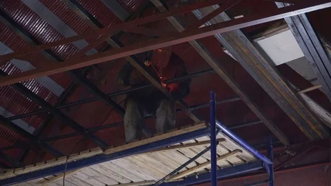 Welder welds a large metal structure Stock Footage 104014339