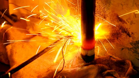 The welder welds the pipe. Stock Footage 95683071