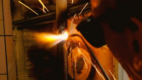 The welder welds the pipe. Stock Footage 95683146