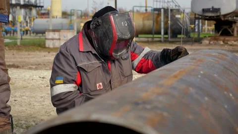 Welder work, close-up, pipe welding, slow motion Stock Footage 142496124