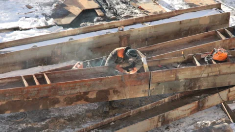 Welder at work on a construction site Stock Footage 103389455