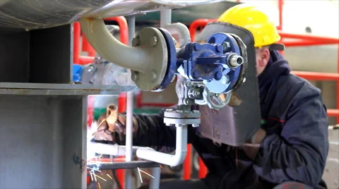 Welder at work in factory Stock Footage 1081055