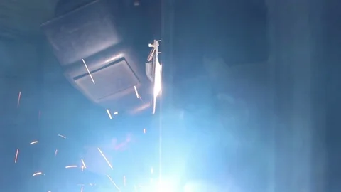Welder at work with metal construction Video stock 73164684