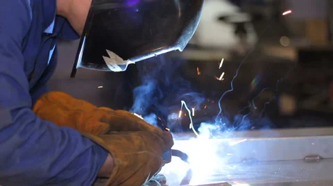 Welder at work in metal industry Stock Footage 63439869