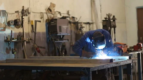 Welder at work in metal industry Video stock 63440272