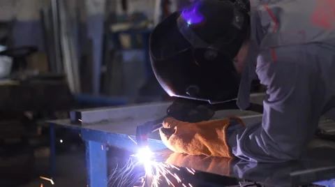 Welder at work in metal industry Stock Footage 63440380