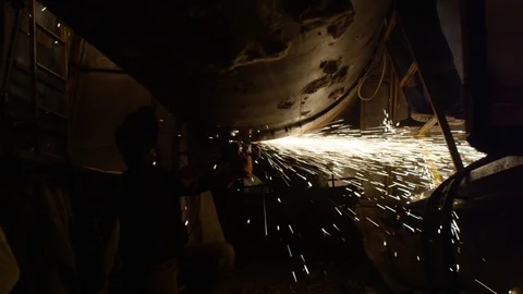 Welder in work with pipe Video stock 123779989