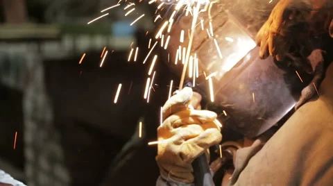 Welder at work. repairing machine Stockbeeldmateriaal 45243086