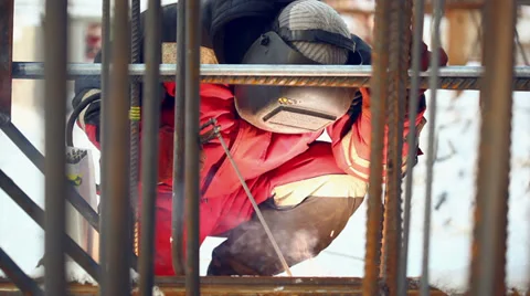 Welder at work welding a metal framework, closeup view Video stock 36297158