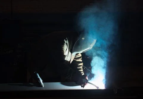 Welder at work, welding of metal structures Stock Photos