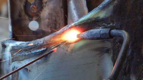 Welder worker welding metal Stock Footage 83970555
