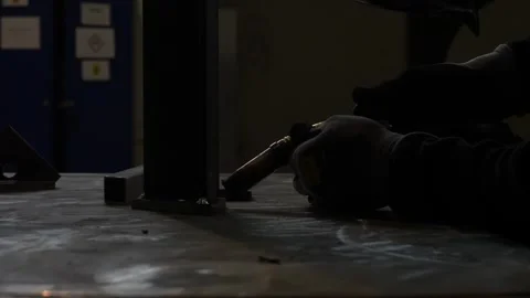 Welder worker welding metal in the workshop Stock Footage 256087486