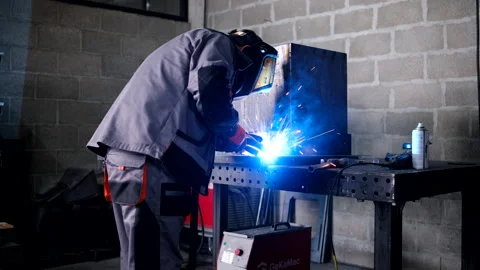 Welder working and soldering iron with mask - slider shot 스톡 동영상 286128267