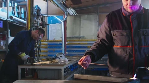 Welder working with autogenous welding tool in workshop Stock Footage 148513739