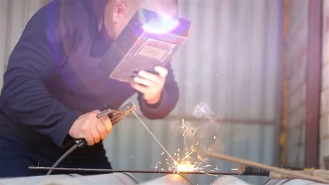 Welder Working in the garage Stock-Footage 77503279
