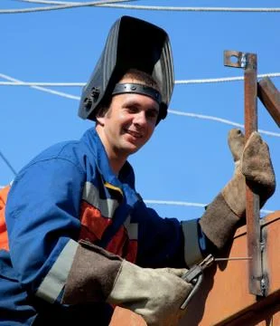 A welder working at height Stock Photos