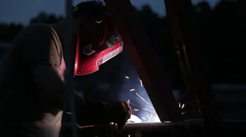 Welder working an industrial sander grinder for metal Stock Footage 53880396