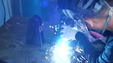 A welder working with iron welding Stock Footage 149229511
