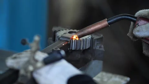 A welder working with iron welding Stock Footage 149229516
