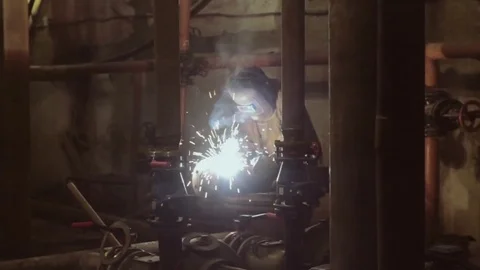 The welder is working. Long shot working process of welding Video stock 74133769