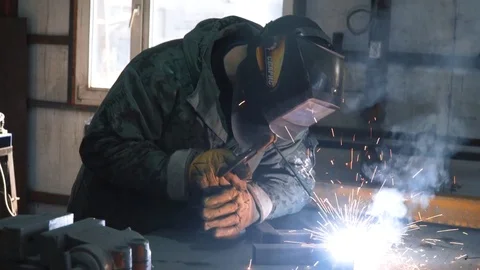 Welder working in melt workshop Stock Footage 73603201