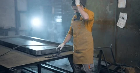 Welder working with metal at the workshop Stock Footage 147294418