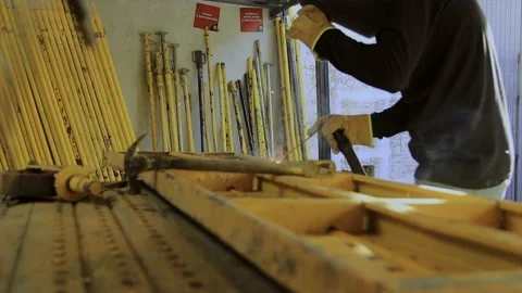 Welder working on spark metal workbench Stock Footage 155366171