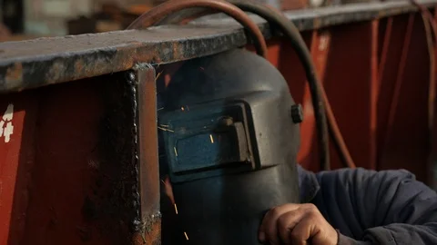 Welder works inside the ship. Stock-Footage 87392580