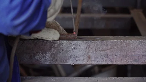 Welder in the workshop welds metal construction closeup Stock Footage 104263345