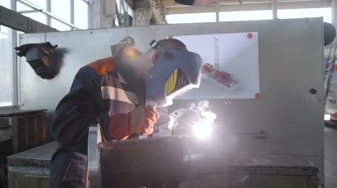 Welder in Workshop Work with Pipe Stock Footage 64687189