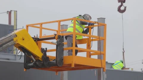 Welders at a construction site. Welder at work slow, metal welding process. Stock Footage 132948102