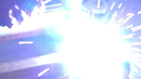 The welding and sparkles flying around with lights Stock Footage 112854619