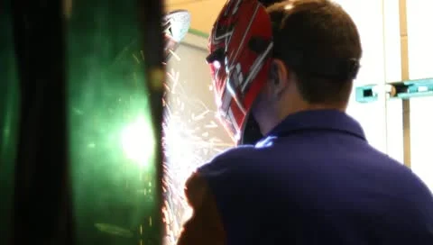 Welding behind curtain Stock-Footage 10724446