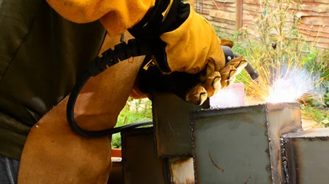 Welding &amp; brushing metal Stock Footage 37986688