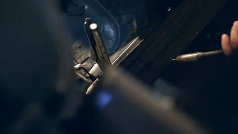 Welding in car body workshop Stock Footage 76350548