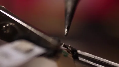 Welding circuit with tin wire soldering iron slow motion4k Stock Footage 83059603