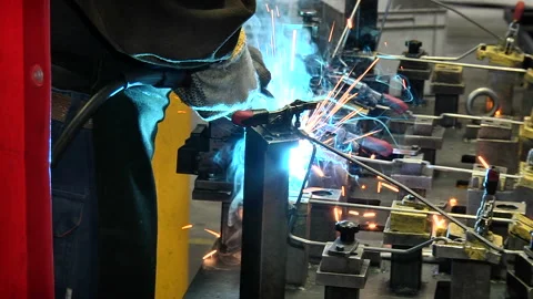 Welding of components for automobile production Stock Footage 96404805
