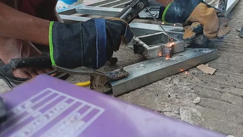 Welding connecting iron Stock Footage 239983879