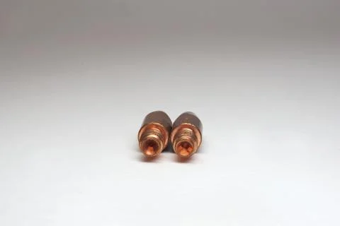 Welding contact tips pair. Threaded tail side Stock Photos