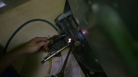 Welding of copper pipes with fire high temperature for refrigeration repair. Stock-Footage 225853830