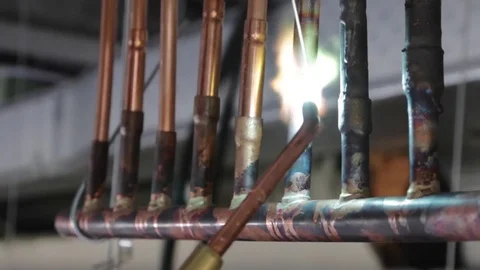 Welding copper tubes with oxidized flame Stock Footage 80811056