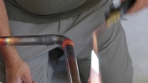 Welding copper tubes with oxidized flame Stock Footage 80811087