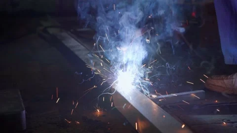 Welding with an electrode weld two iron corners. Stock Footage 153771064