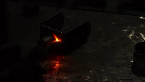 Welding fabrication process metal binding process up-close slow motion Stock Footage 320338036