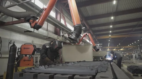 Welding on the factory. Welders on work. Stock Footage 130744126