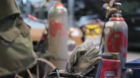 Welding Gloves on then off. Stock Footage