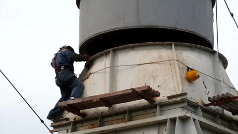 Welding of guide posts for mounting a pipe section Stock Footage 249526915